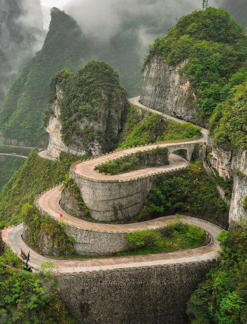 Picture of a road winding up a hill